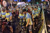 Thousands of cyclists at the start line of the Community Challenge bike ride.