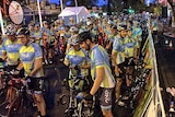 Thousands of cyclists at the start line of the Community Challenge bike ride.