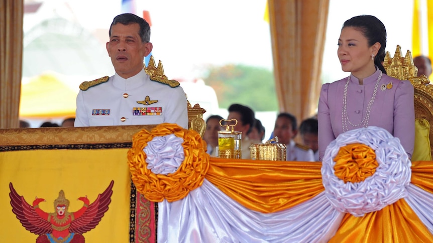 Thai Crown Prince Maha Vajiralongkorn (L) and Princess Srirasmi (R) attend the annual Royal Ploughing Ceremony at Sanam Luang in Bangkok on May 13, 2010.
