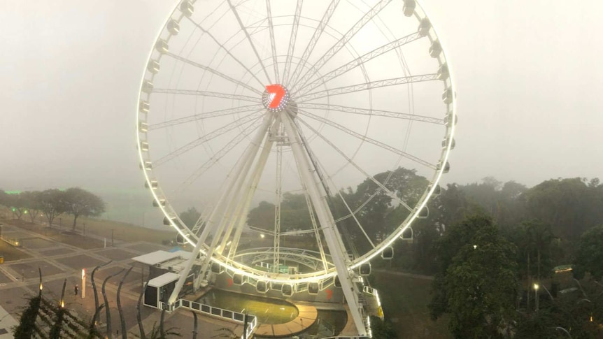 Thick fog blankets Brisbane river at South Bank.