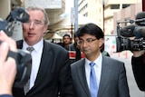 Former Perth barrister Lloyd Rayney (r) and lawyer Martin Bennett outside a Perth court.