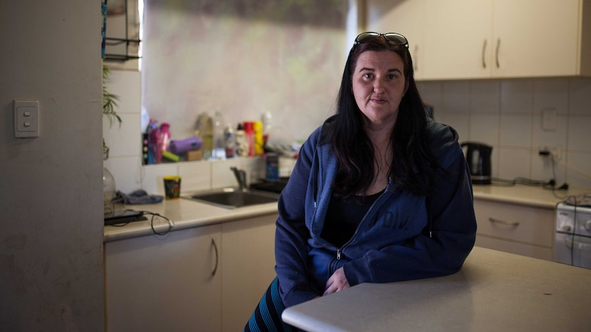 Cashless welfare card trial participant Sylvia Asusaar sits in the kitchen of her Kalgoorlie home.