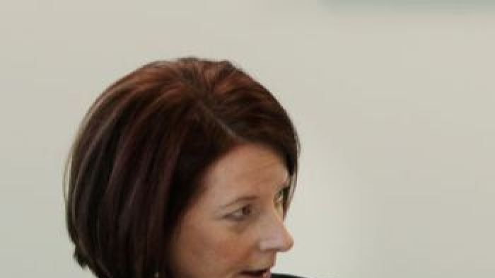 Face-to-face: Julia Gillard meets with her predecessor Kevin Rudd at the Commonwealth offices in Brisbane