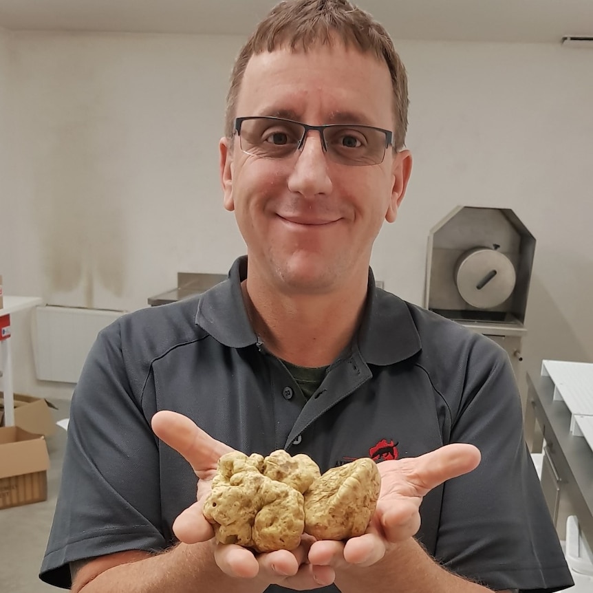 Truffle grower Gavin Booth holding some of his produce.