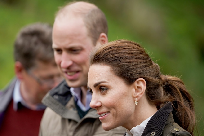 Prince William and Princess Catherine on a farm.