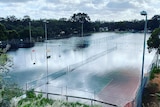 Water covering tennis courts in Mildura.