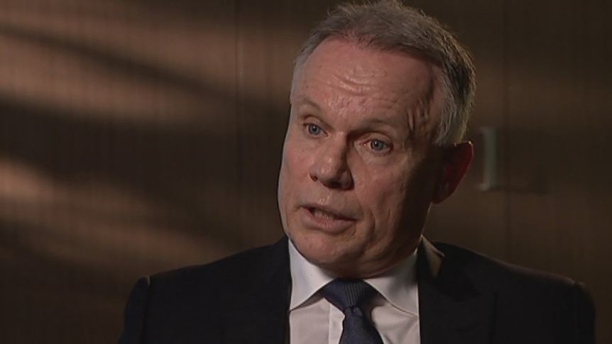 Portrait photograph of NIB managing director Mark Fitzgibbon in a TV studio