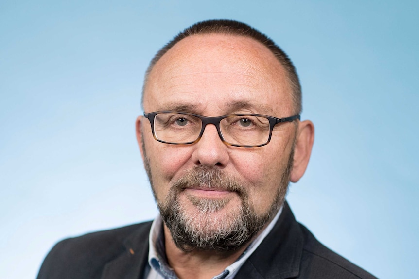 A headshot of Frank Magnitz.