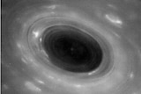 A black and white image of Saturn's atmosphere captured by NASA's Cassini spacecraft.