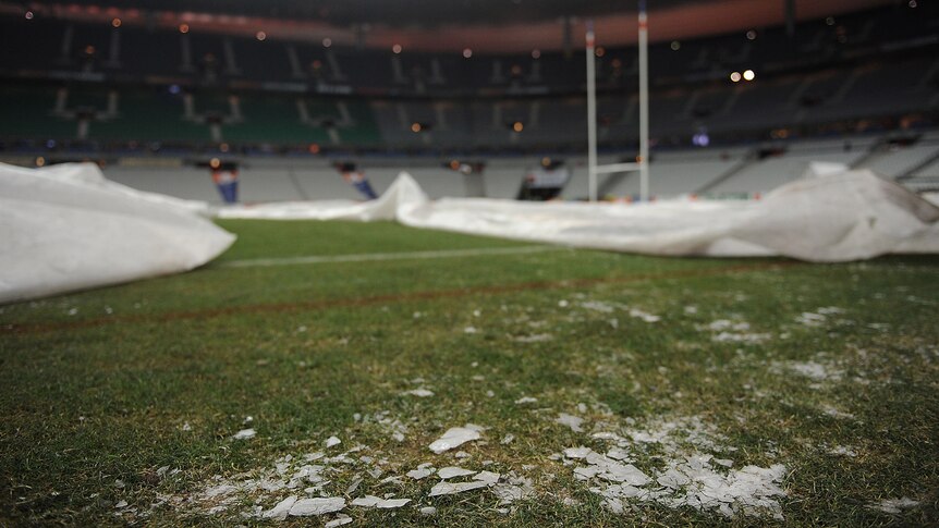 On ice ...the rock-hard frozen pitch prompted match officials to postpone the France-Ireland clash.