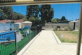 A backyard in Adelaide with a pool fenced off
