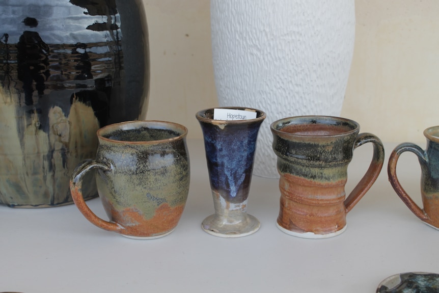 Finished pottery mugs
