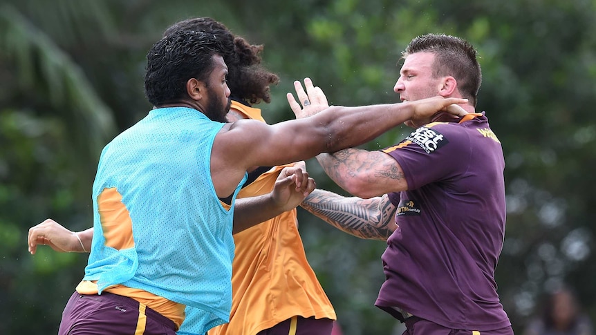 Josh McGuire and Salesi Funaki scuffle at Brisbane Broncos training