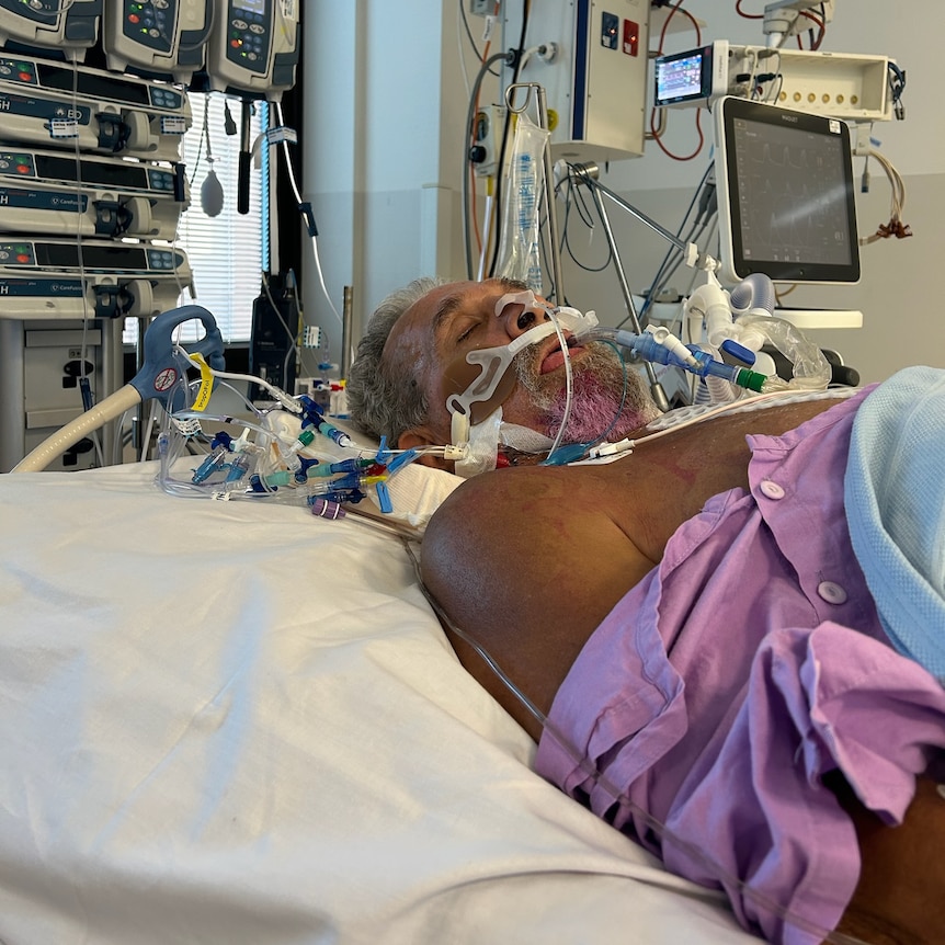 man in hospital on ventilator