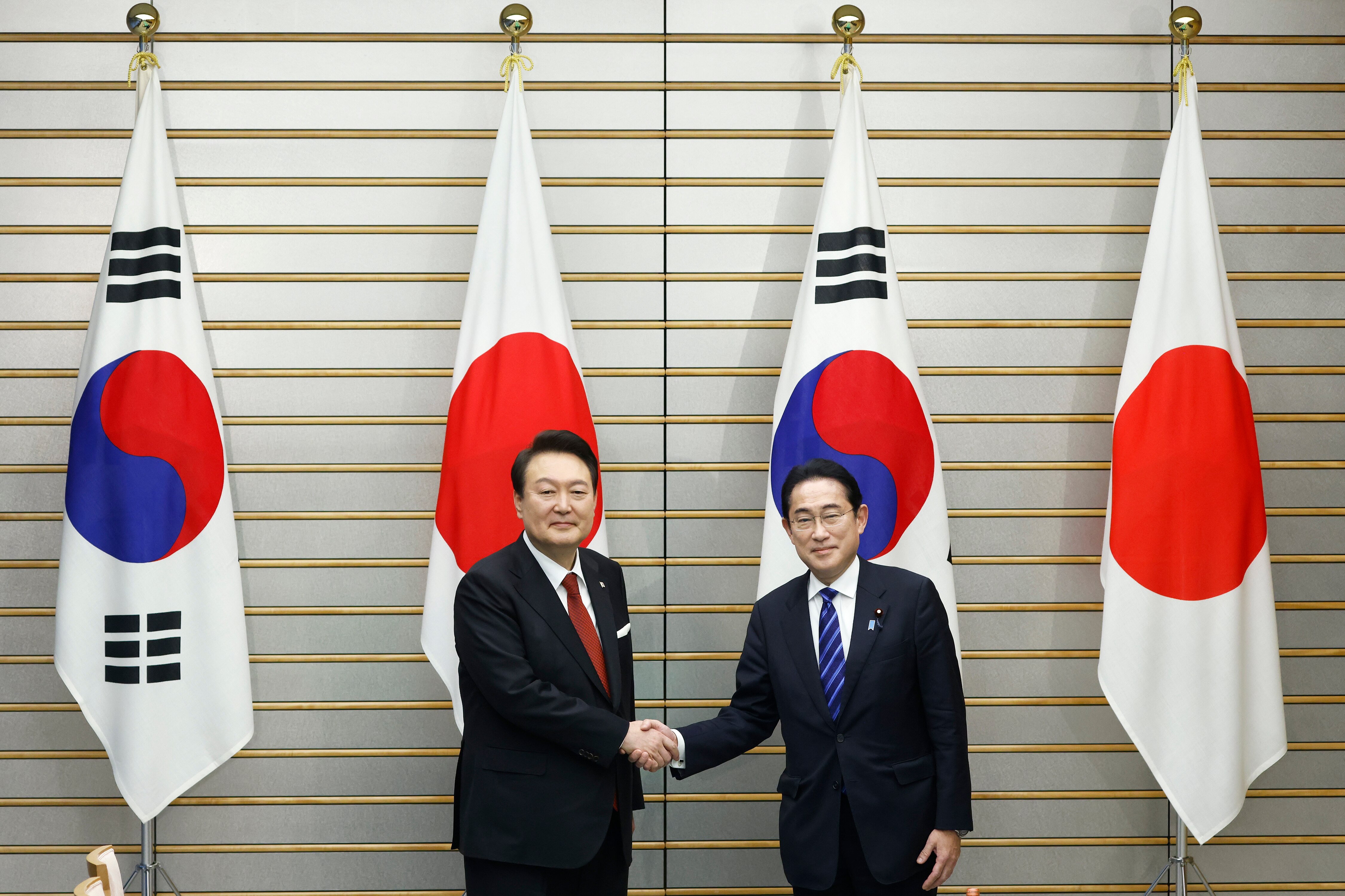 Frenemies Japan and South Korea hold landmark talks - ABC listen