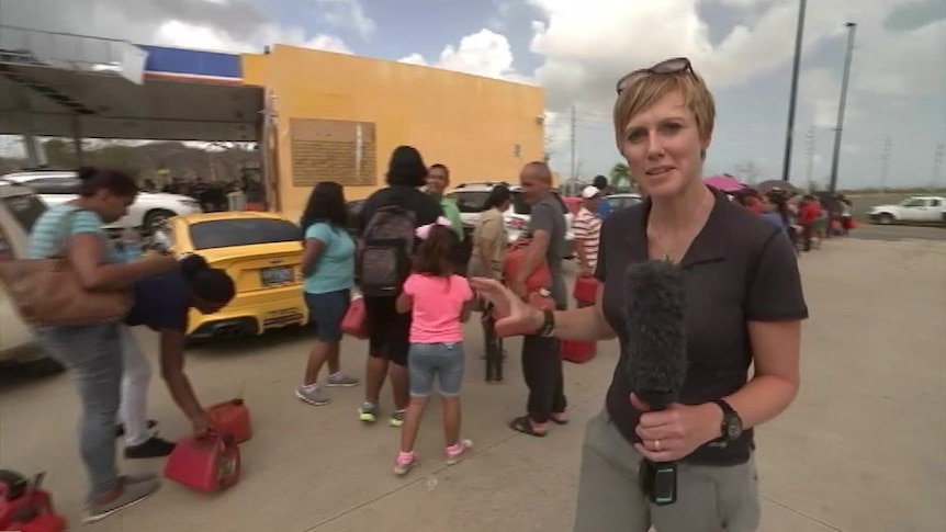 Puerto Rico residents line for fuel, water