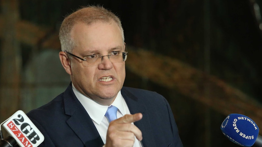 Treasurer Scott Morrison slams Labor leader Bill Shorten's decision to repeal company tax cuts