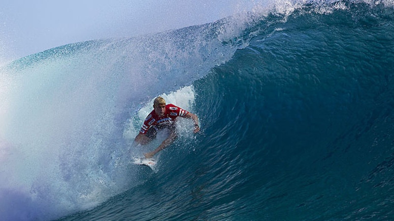 Second-round revival: Mick Fanning carves it up in Tahiti.