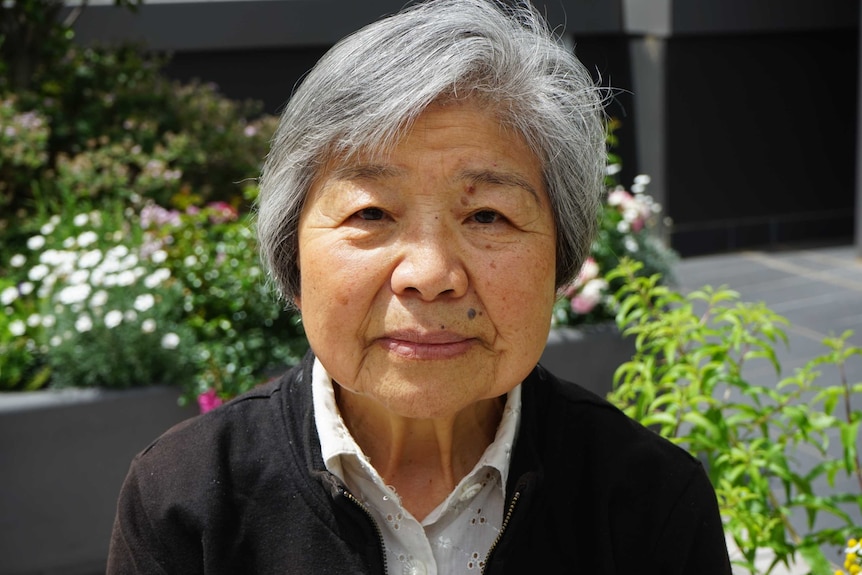 A headshot of a woman