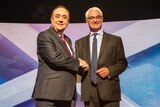 Alex Salmond (L) shakes hands with Alistair Darling (R) ahead of the debate on Scottish independence