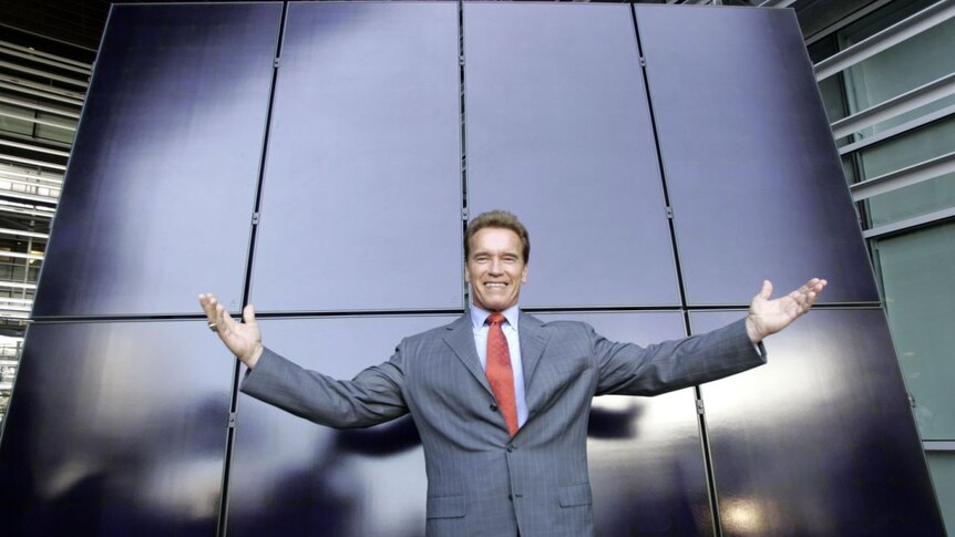 Arnold Schwarzenegger with solar panels