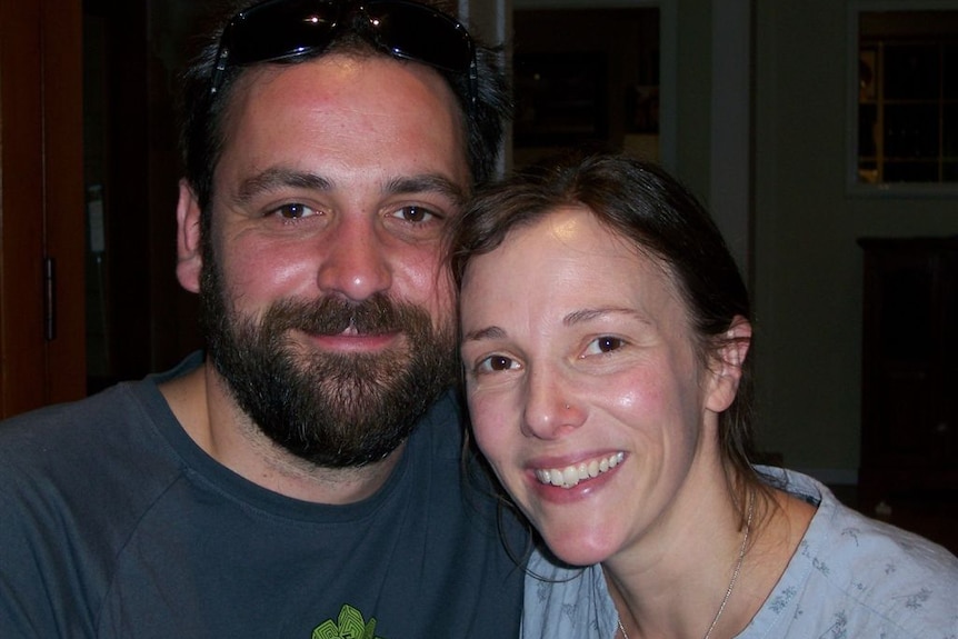 Mat Kavanagh and his wife Jude smile happily at the camera.