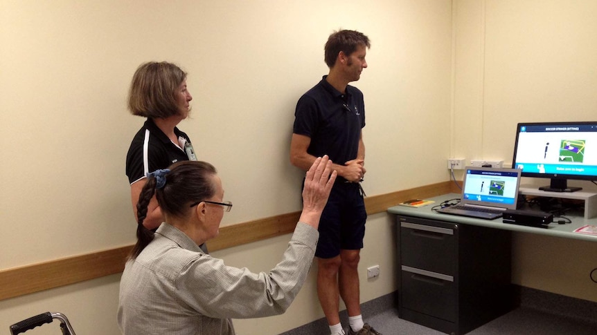 Stroke patient Anita Jupp, using new gaming technology for physiotherapy