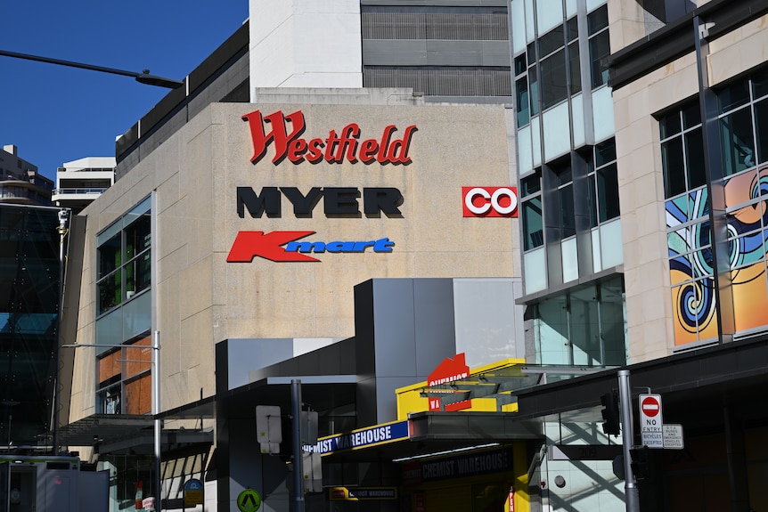 A building bearing the logos of Westfield, Myer and Kmart.