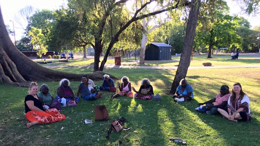A photo of around 10 elders met in a Kununurra park to discuss youth crime.