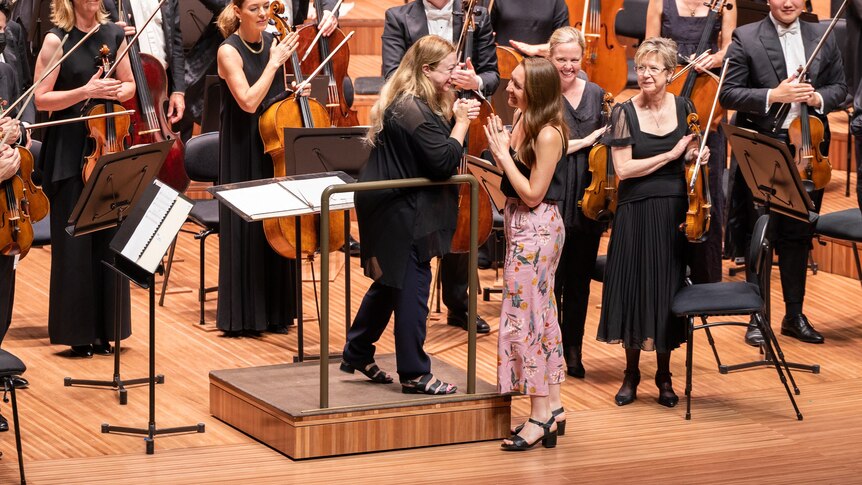 Composer Ella Macens takes a bow after the debut of her Sydney Symphony Orchestra 50 Fanfares Commission: Release.