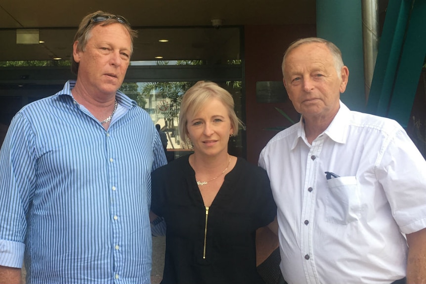 Gavin Loakes, Angie Jorgensen and Bryan Loakes standing together outside court.