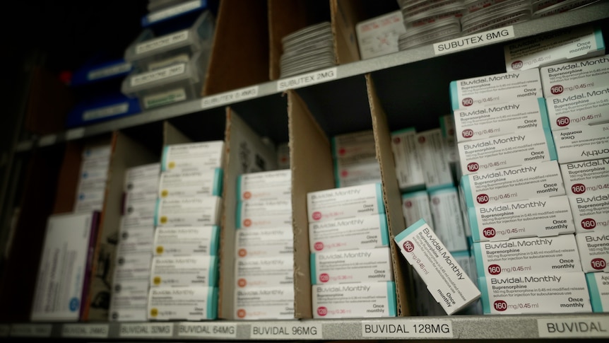 Boxes of medication, including Buvidal, stacked up in a pharmacy 