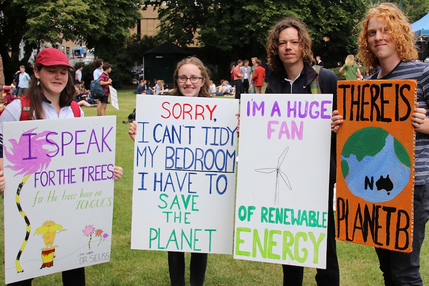 Students holding placards at climate action rally, Hobart, 29 November 2018.