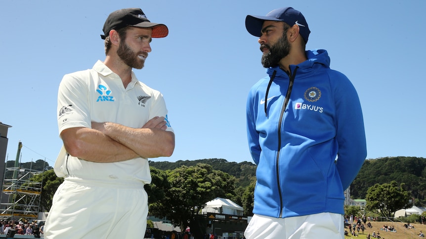 Two Test cricket captains from New Zealand and India talk after a match.