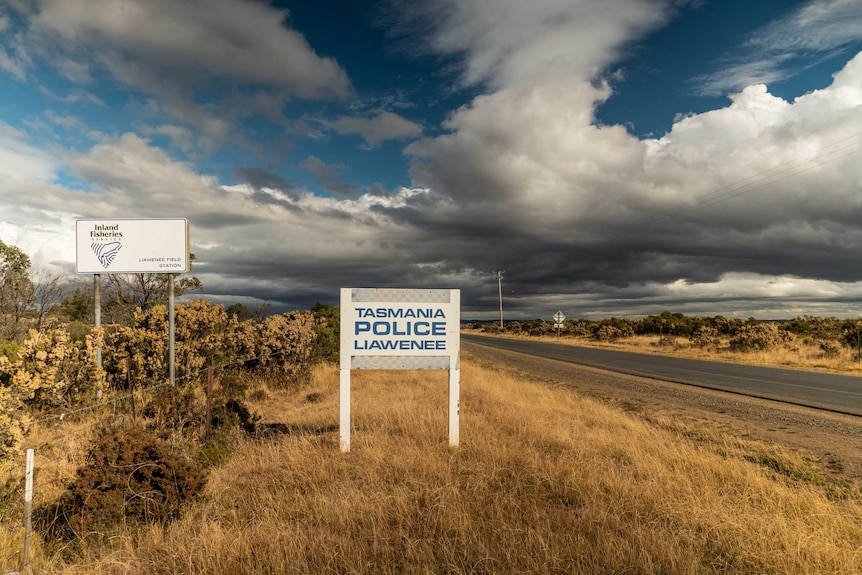 A sign on the highway for the Liawenee Police Station.