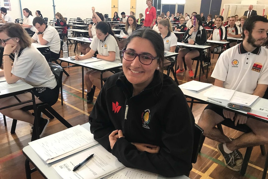 HSC student Rosa-May Williams-Karam sits at her desk, ready to do her maths final.