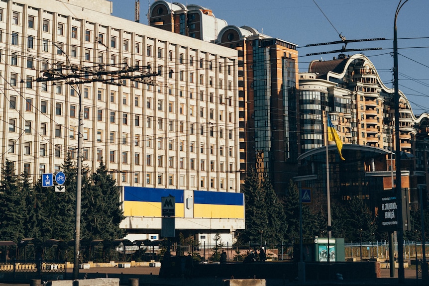 Buildings outside with Ukrainian flag