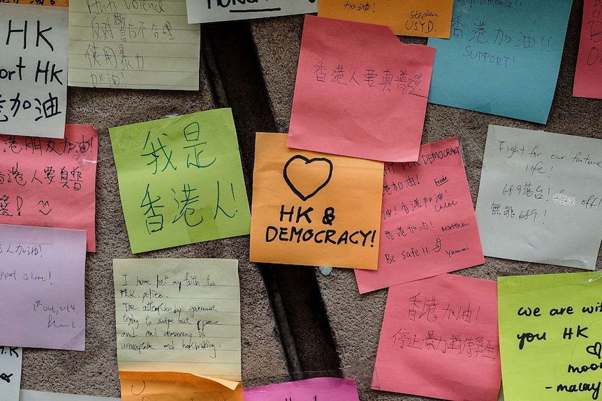 Post-it notes stuck on a wall outside Hong Kong House in Sydney in support of protests in Hong Kong.