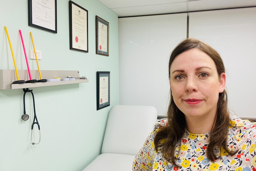 Dr Rowena Mobbs sits in her office