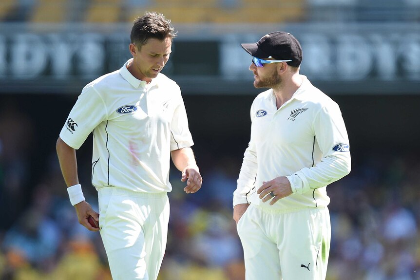 New Zealand's Trent Boult speaks to captain Brendon McCullum in the first Test against Australia.