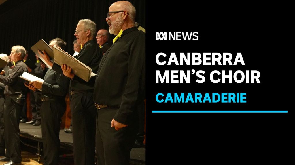 Camberra Mens Choir. Camaraderie. Men standing singing.