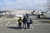 Boys look at the closed Juventus Stadium, after the team's match against Inter Milan was postponed.