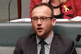 Adam Bandt sits in the House of Representatives