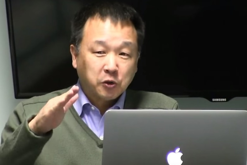Henry Woo at a a lecture