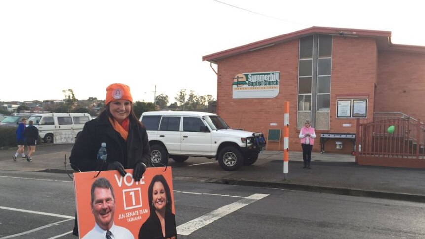 Jacqui Lambie arrives at a polling booth on election day