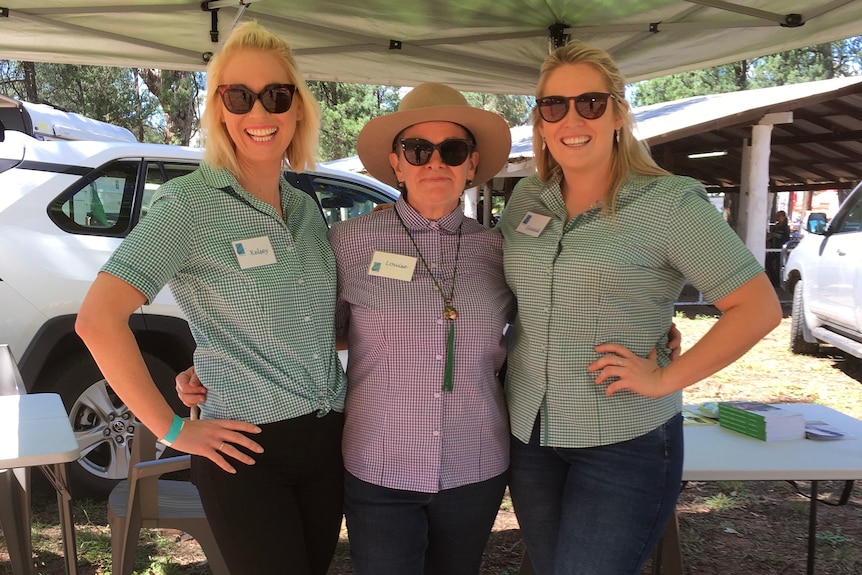 Louise Hennessy, middle, helps provide counselling services to fellow residents affected by the mouse plague.