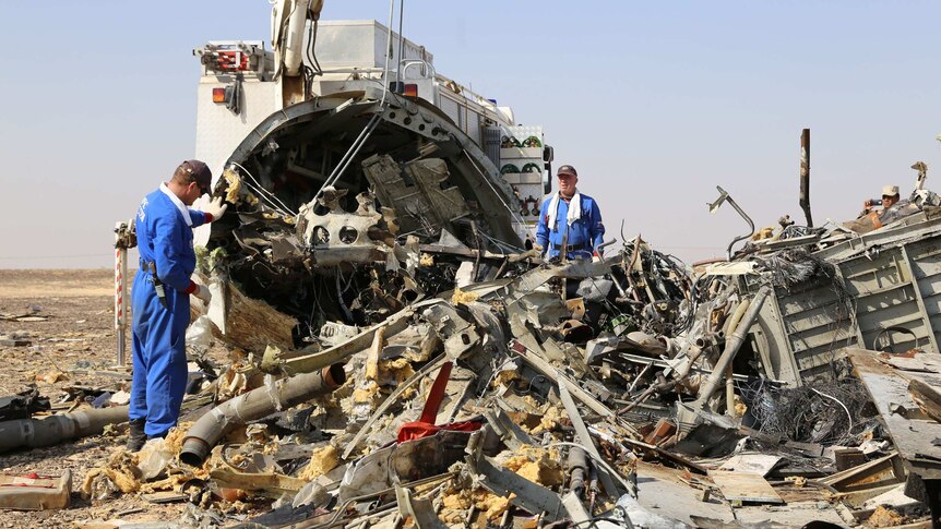 Russian emergency workers at site of Metrojet crash