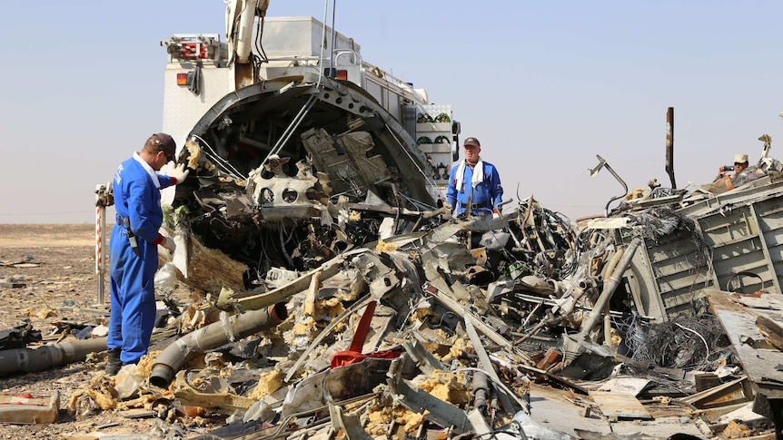 Russian emergency workers at site of Metrojet crash