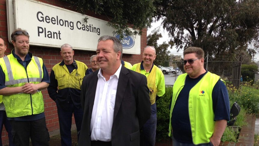 Adrian Reedman with workers outside the Ford plant in Geelong.