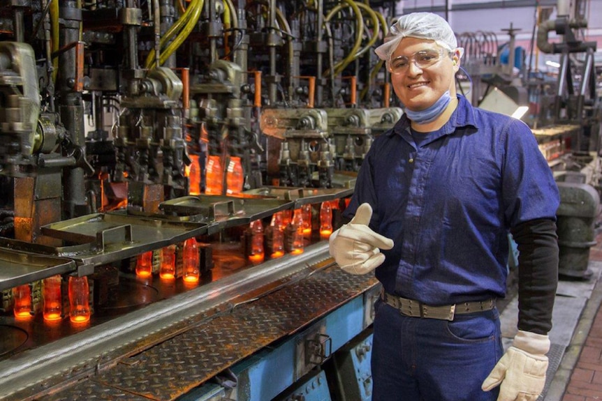 Glass recycling plant creating new bottles.